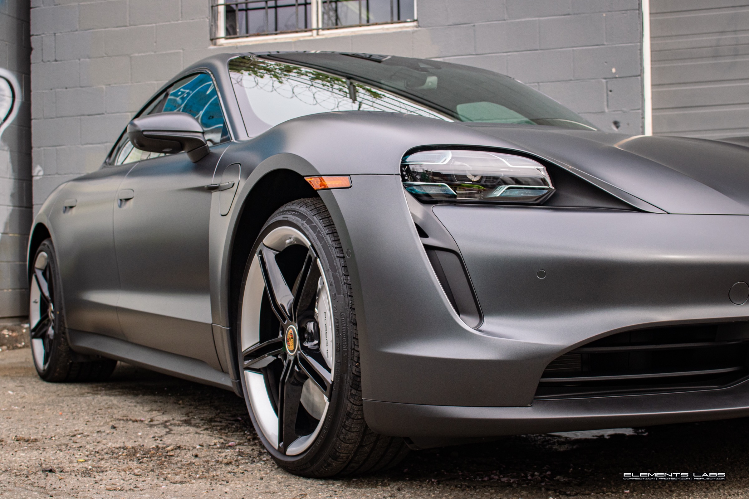 Front finish detail on 2023 Porsche Taycan Turbo Satin PPF