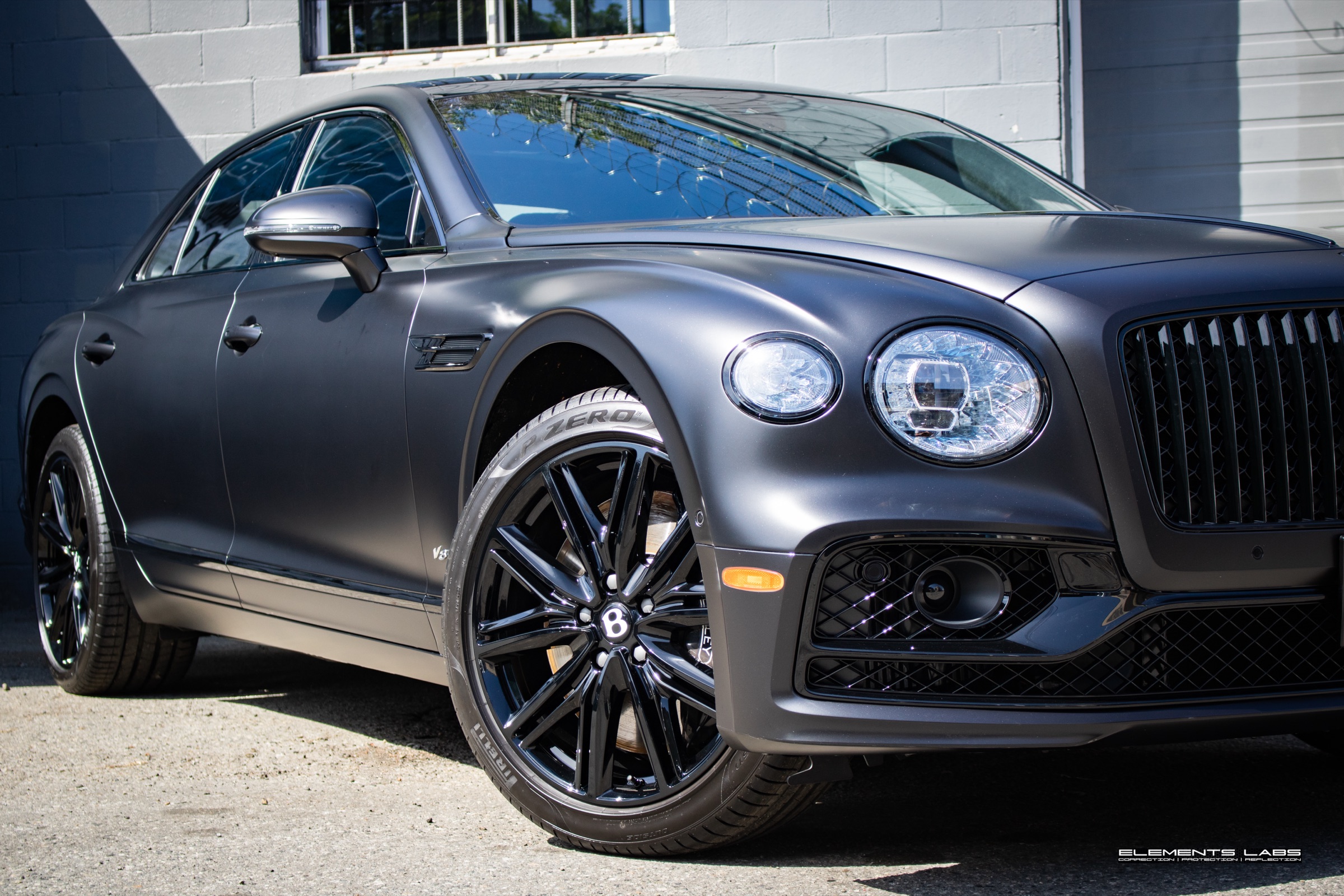 Front finish view of a 2024 Bentley Flying Spur with matte/satin PPF