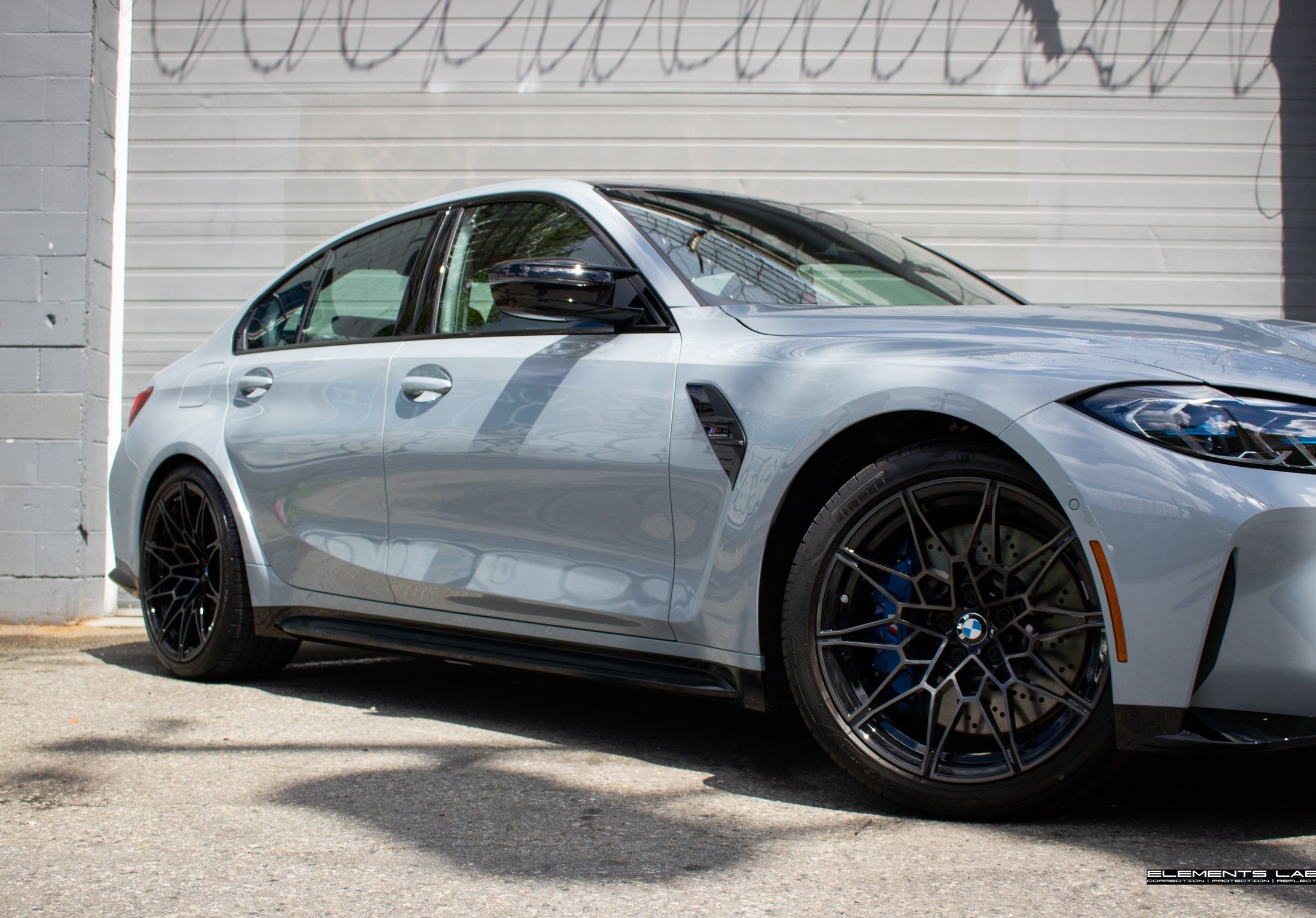Detail view of BMW i4 paint correction and Graphene Revivify finish