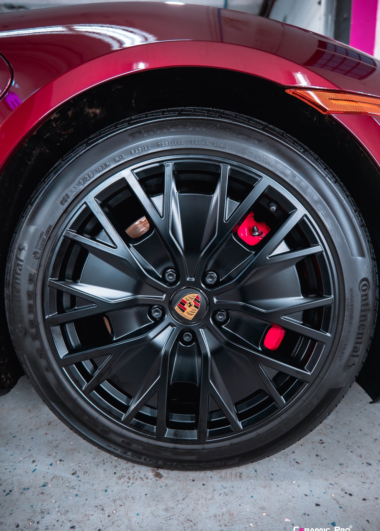 Wheel and caliper detail on a 2021 Porsche Taycan 4S ceramic coating project