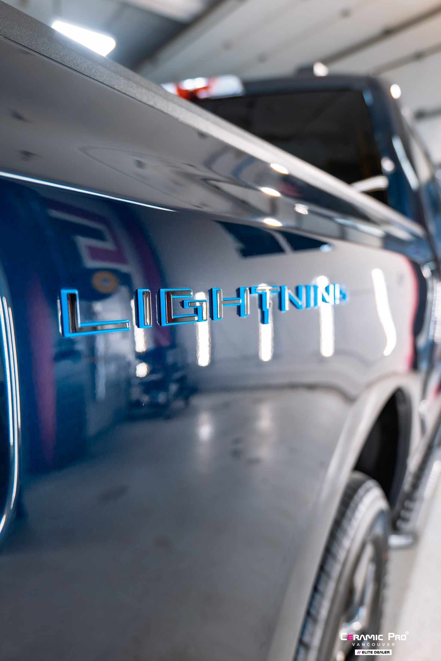 Wheel and tire detail on a 2024 Ford F-150 Lightning ceramic coating project
